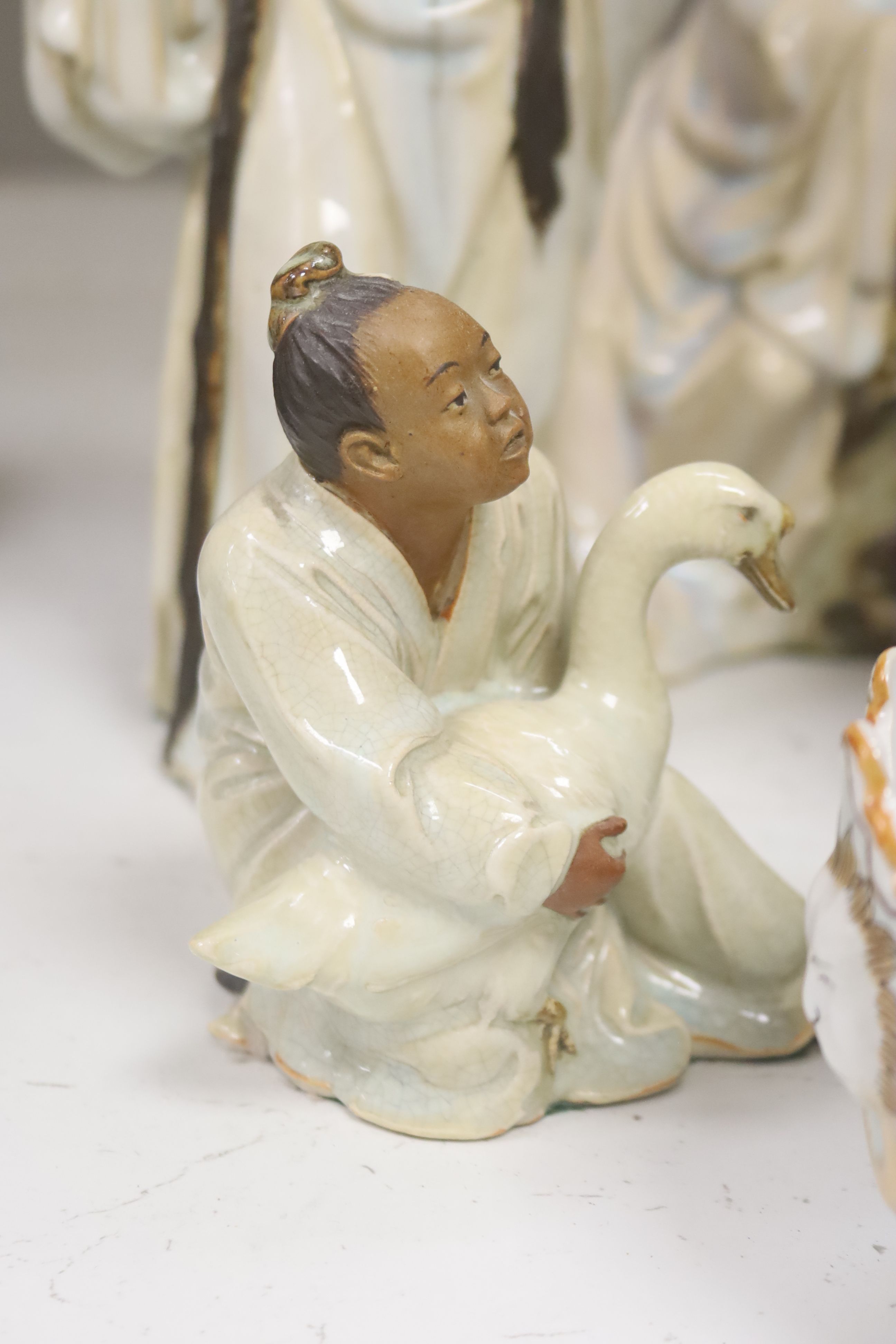 Three Chinese 20th century Shiwan glazed stoneware figures, porcelain boxes and sundries, tallest 32cm